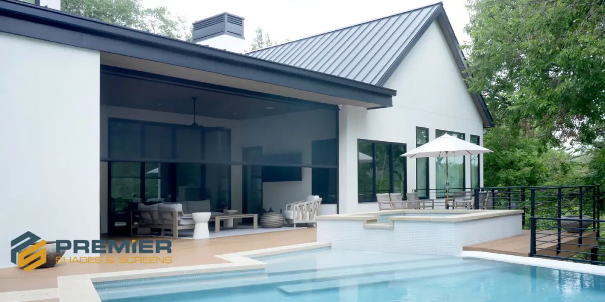A custom exterior solar shade installed on a home by Premier Shades & Screens